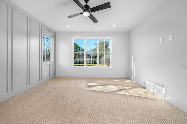 unfurnished room featuring recessed lighting, a ceiling fan, visible vents, and light carpet