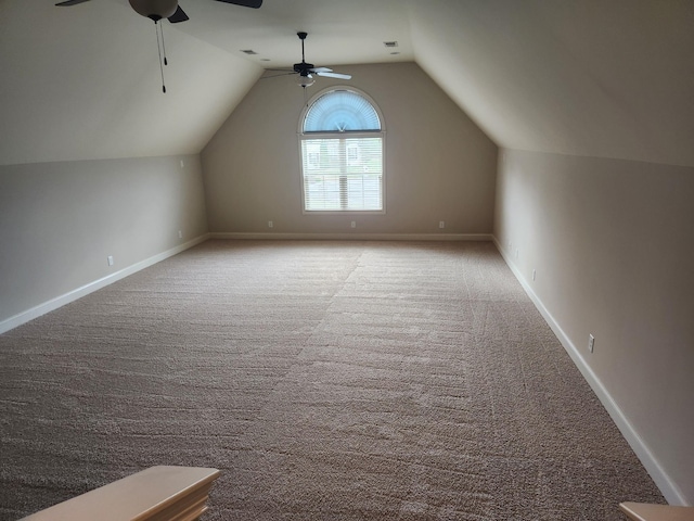 bonus room featuring baseboards, a ceiling fan, carpet, and vaulted ceiling