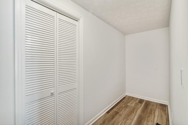 144 Tanasi Shr, Gallatin, TN 37066 - interior space with a textured ceiling, baseboards, and wood finished floors