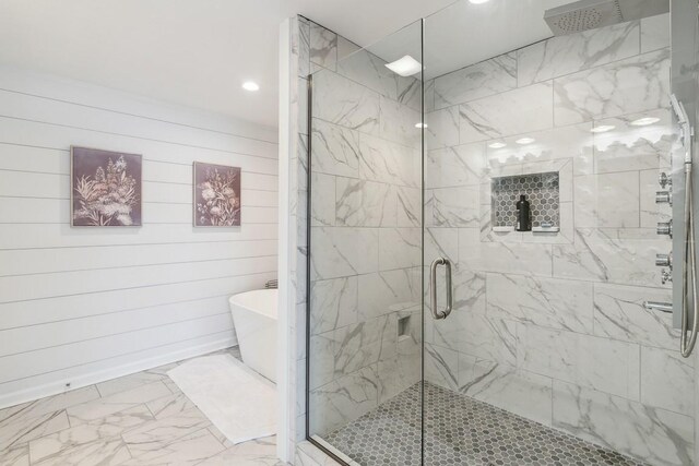 144 Tanasi Shr, Gallatin, TN 37066 - full bath with a soaking tub, marble finish floor, and a stall shower