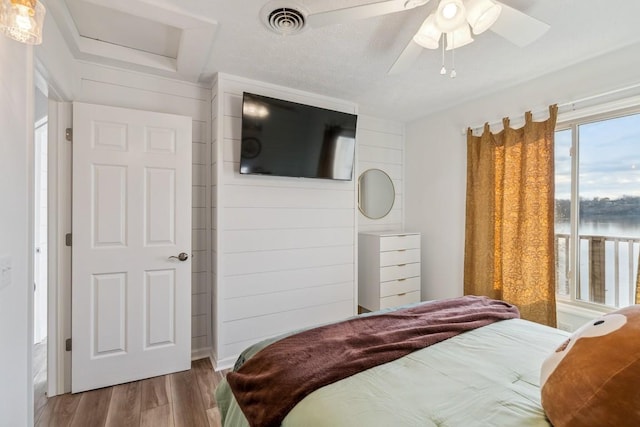 144 Tanasi Shr, Gallatin, TN 37066 - bedroom featuring ceiling fan, visible vents, and wood finished floors