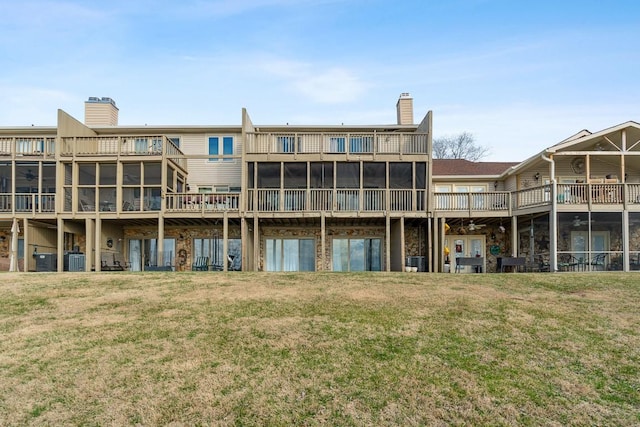 144 Tanasi Shr, Gallatin, TN 37066 - back of property with a yard, central AC, and a chimney
