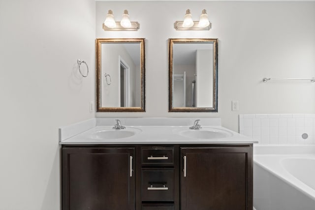 568 Tracy Ln, Clarksville, TN 37040 - bathroom featuring double vanity and a garden tub