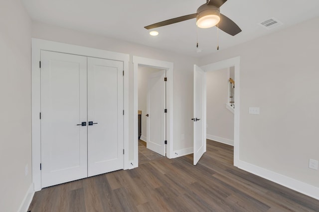 1016 W Kirkland Ave Unit C, Nashville, TN 37216 - unfurnished bedroom with visible vents, wood finished floors, a closet, baseboards, and ceiling fan