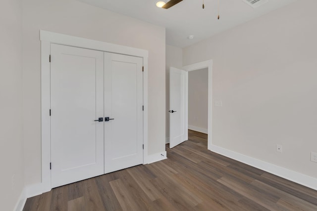 1016 W Kirkland Ave Unit C, Nashville, TN 37216 - unfurnished bedroom featuring visible vents, a ceiling fan, wood finished floors, a closet, and baseboards