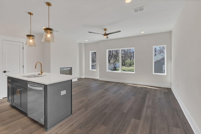 1016 W Kirkland Ave Unit C, Nashville, TN 37216 - kitchen featuring visible vents, open floor plan, dishwasher, light countertops, and a sink