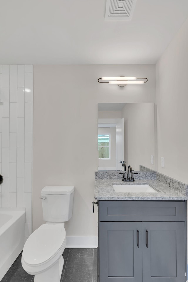 1016 W Kirkland Ave Unit C, Nashville, TN 37216 - full bath featuring visible vents, tub / shower combination, baseboards, toilet, and vanity