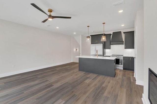 1016 W Kirkland Ave Unit C, Nashville, TN 37216 - kitchen with a ceiling fan, visible vents, stainless steel appliances, custom range hood, and tasteful backsplash