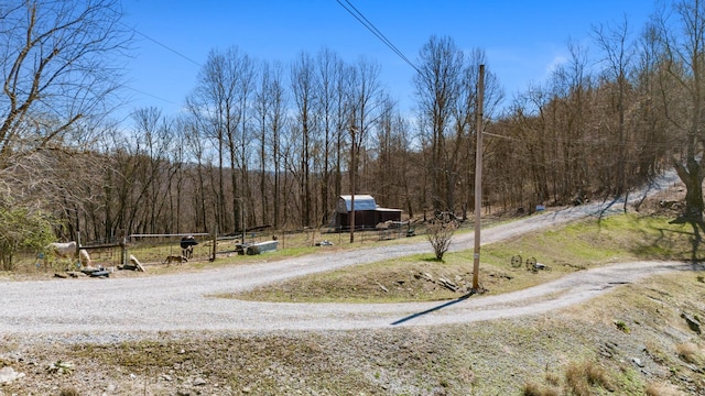 view of street featuring a view of trees