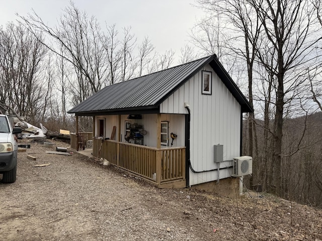 view of outbuilding with ac unit