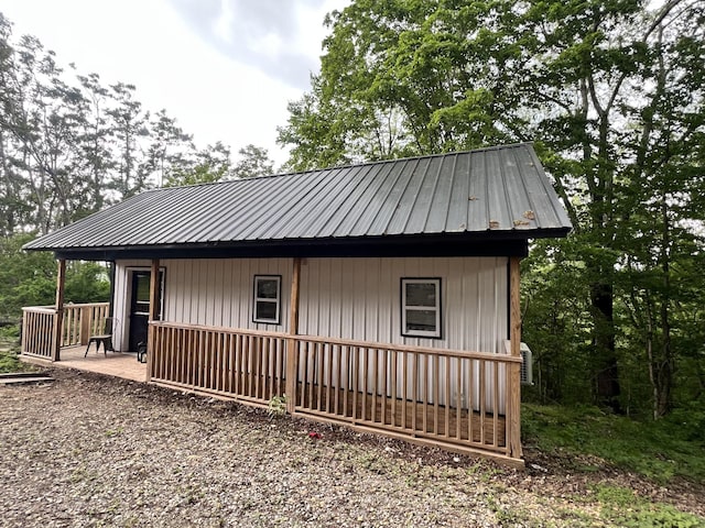 exterior space featuring metal roof