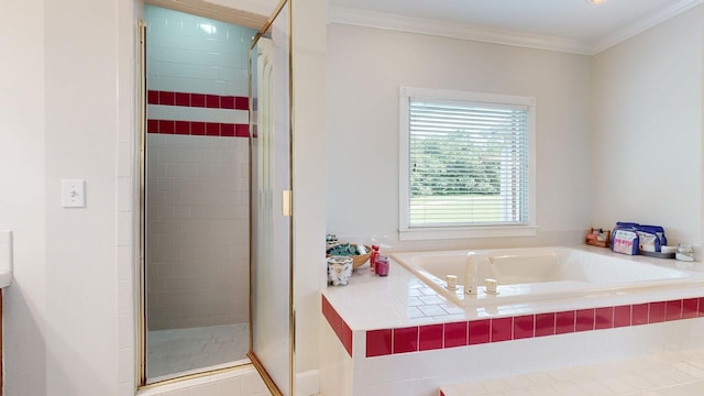 full bath with a shower stall, crown molding, and a garden tub