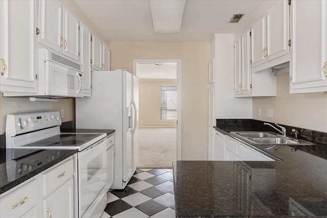 975 General George Patton Rd, Nashville, TN 37221 - kitchen with a sink, visible vents, white appliances, and white cabinets