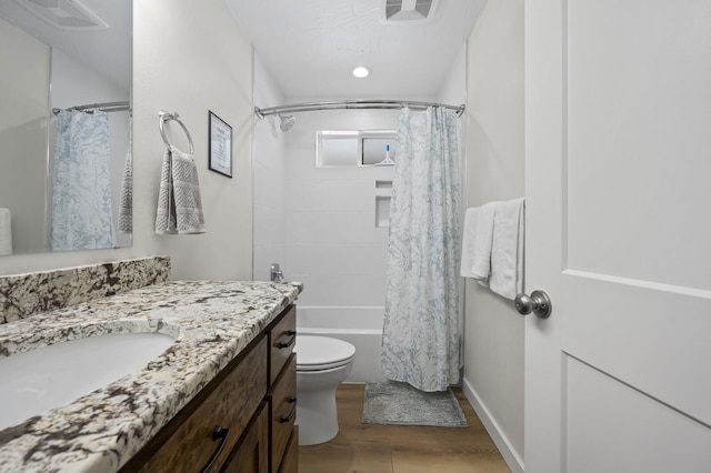 744 Dobbins Pike, Gallatin, TN 37066 - full bath featuring vanity, wood finished floors, toilet, and shower / bath combination with curtain