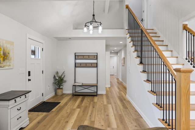 744 Dobbins Pike, Gallatin, TN 37066 - foyer entrance featuring stairs, light wood-style flooring, a chandelier, and baseboards