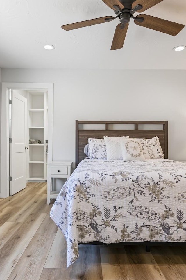 744 Dobbins Pike, Gallatin, TN 37066 - bedroom featuring wood finished floors, ceiling fan, recessed lighting, and a walk in closet