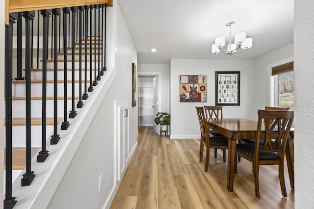 744 Dobbins Pike, Gallatin, TN 37066 - dining area featuring a chandelier, recessed lighting, baseboards, light wood-style flooring, and stairs