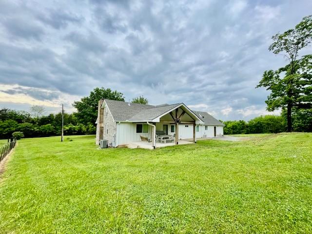 744 Dobbins Pike, Gallatin, TN 37066 - view of front of home featuring a patio area, a front lawn, and cooling unit