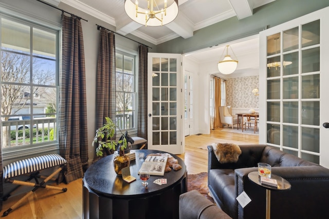1434 Westhaven Blvd, Franklin, TN 37064 - interior space with beamed ceiling, plenty of natural light, wood finished floors, an inviting chandelier, and crown molding