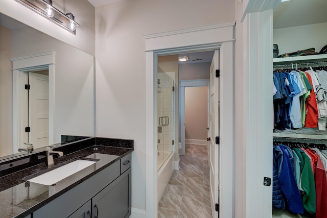 209 Gilchrist S Cir, Nolensville, TN 37135 - full bathroom featuring vanity, a spacious closet, and marble look tiles