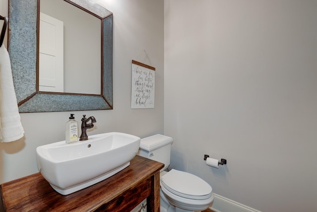 209 Gilchrist S Cir, Nolensville, TN 37135 - bathroom with toilet, vanity, and baseboards