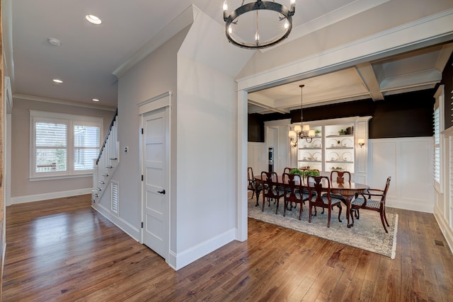 209 Gilchrist S Cir, Nolensville, TN 37135 - dining space featuring a chandelier, dark wood-style flooring, stairs, crown molding, and beamed ceiling