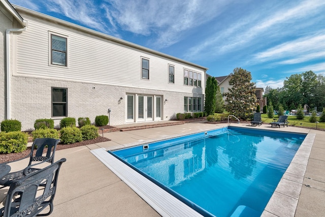 209 Gilchrist S Cir, Nolensville, TN 37135 - swimming pool featuring a patio area and french doors