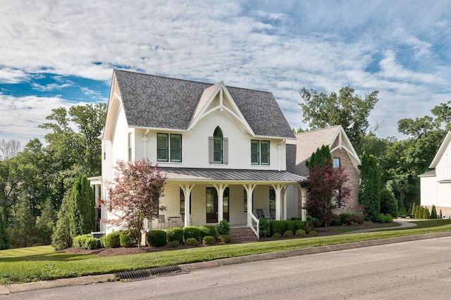 209 Gilchrist S Cir, Nolensville, TN 37135 - view of front facade with a porch, a standing seam roof, roof with shingles, and brick siding