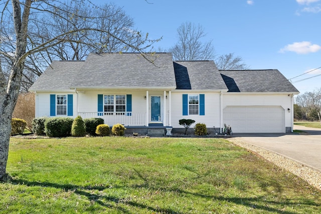 view of front facade featuring driveway, a front lawn, a garage, and roof with shingles