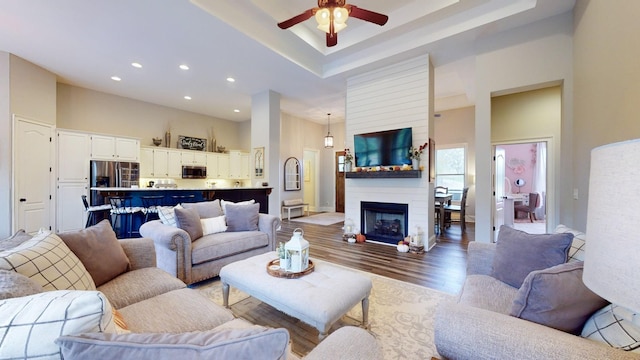 1945 Mann Rd, Lebanon, TN 37087 - living area featuring a high ceiling, wood finished floors, ceiling fan, recessed lighting, and a fireplace