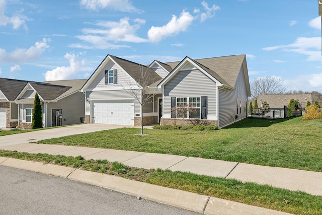 view of front of house with brick siding, an attached garage, concrete driveway, and a front lawn