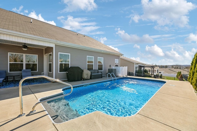 view of swimming pool with central air condition unit, a ceiling fan, a patio, a fenced backyard, and a fenced in pool