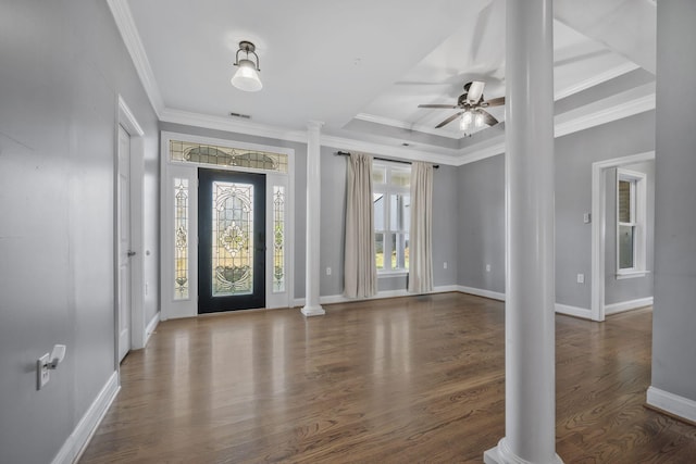 entryway featuring ceiling fan, decorative columns, wood finished floors, and ornamental molding