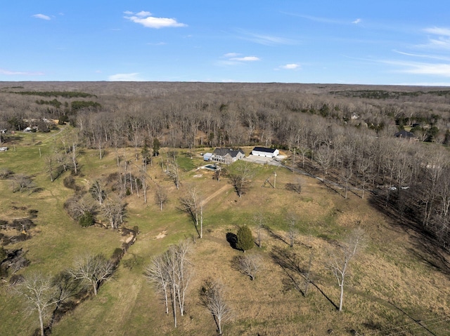 birds eye view of property with a rural view