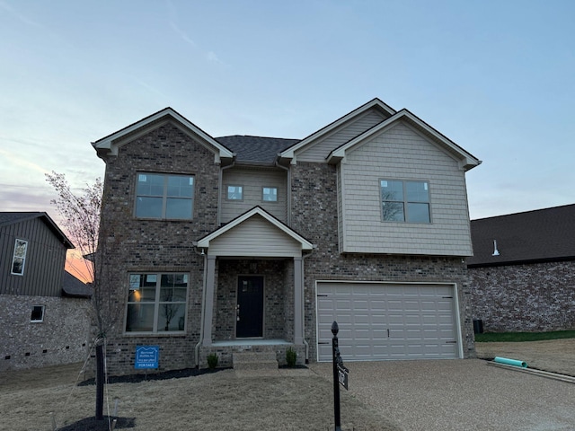 7132 Silverwood Trl, Hermitage, TN 37076 - view of front of house with brick siding, a garage, and driveway