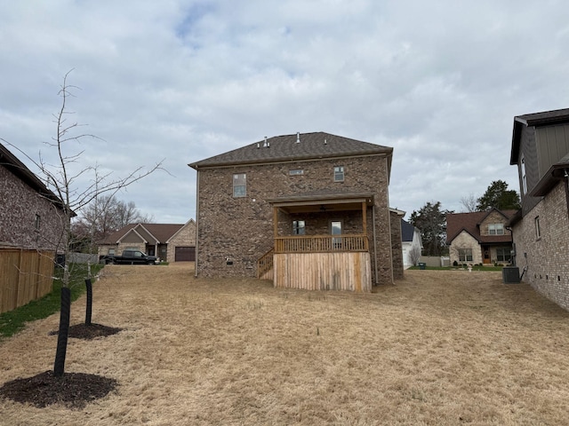 7132 Silverwood Trl, Hermitage, TN 37076 - rear view of house with central air condition unit, brick siding, and fence