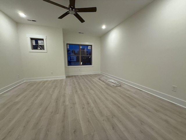 7132 Silverwood Trl, Hermitage, TN 37076 - unfurnished living room with light wood-style flooring, a ceiling fan, visible vents, and baseboards