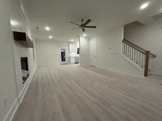7132 Silverwood Trl, Hermitage, TN 37076 - unfurnished living room with recessed lighting, light wood finished floors, baseboards, ceiling fan, and stairs