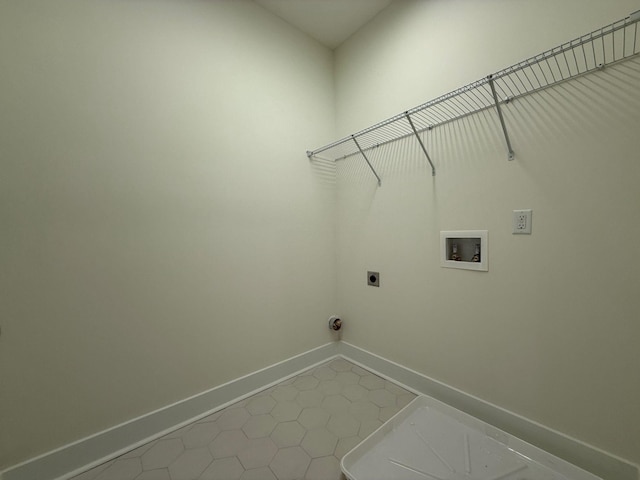 7132 Silverwood Trl, Hermitage, TN 37076 - washroom featuring electric dryer hookup, tile patterned floors, baseboards, hookup for a washing machine, and laundry area