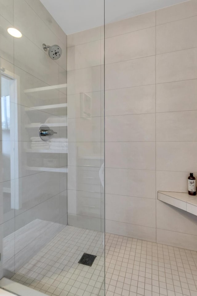 full bathroom featuring a stall shower