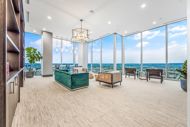 1616 W End Ave Unit 2602, Nashville, TN 37203 - living area featuring an inviting chandelier, floor to ceiling windows, and carpet flooring