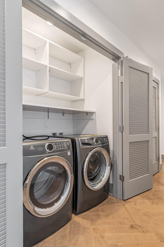 1616 W End Ave Unit 2602, Nashville, TN 37203 - laundry area with laundry area and washing machine and dryer