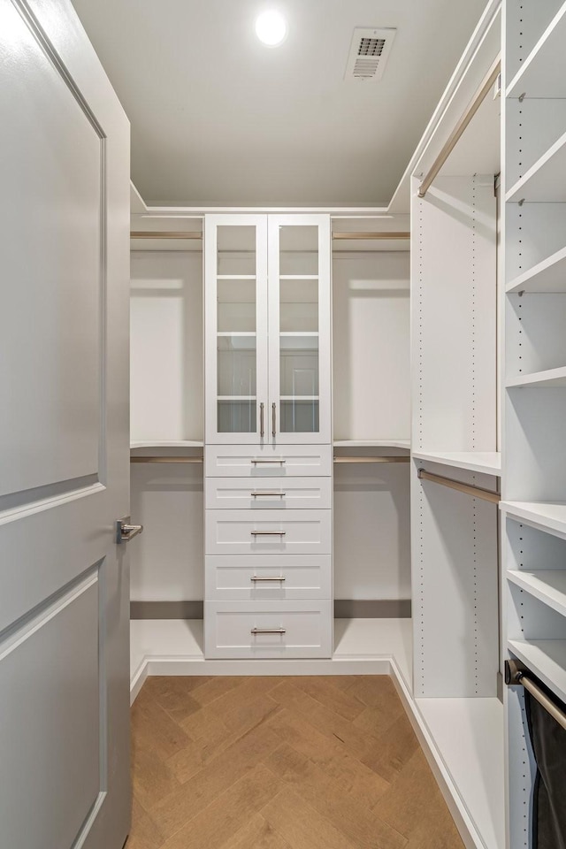 1616 W End Ave Unit 2602, Nashville, TN 37203 - walk in closet with visible vents and light wood finished floors