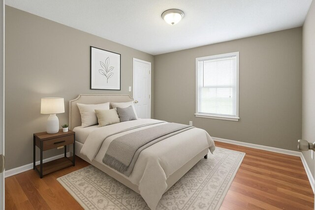 122 Gleaves Ln, Oak Grove, KY 42262 - bedroom with light wood finished floors and baseboards