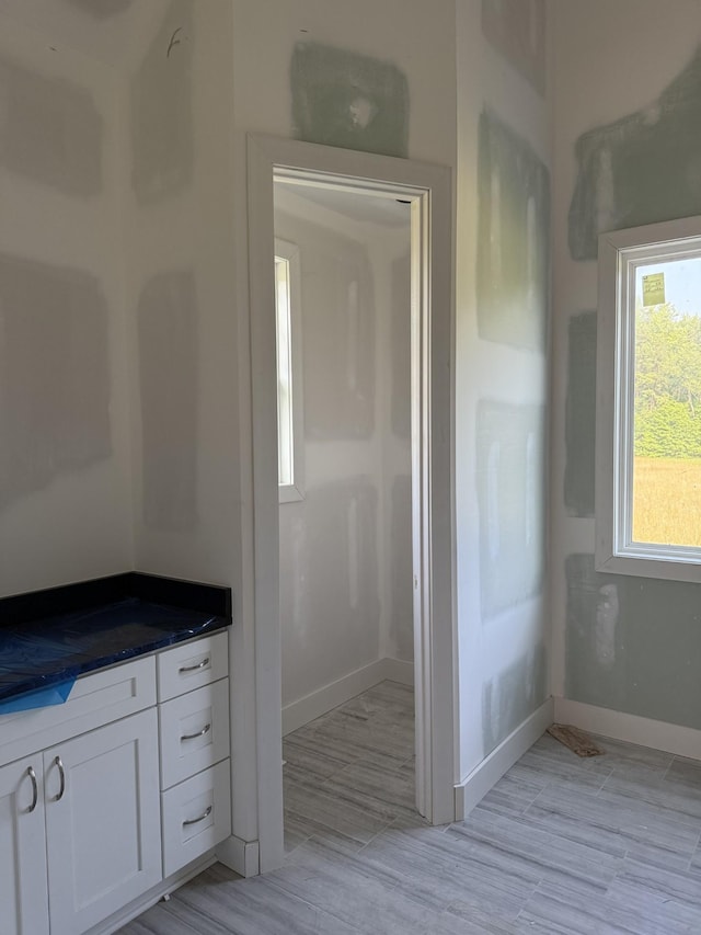 1513 Garners Creek Rd, Dickson, TN 37055 - bathroom featuring baseboards and wood finished floors