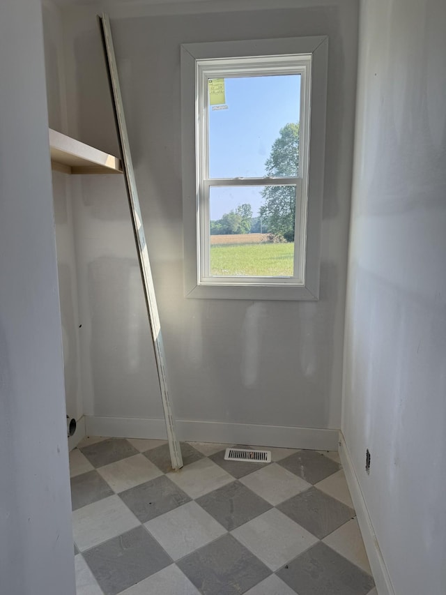 1513 Garners Creek Rd, Dickson, TN 37055 - unfurnished bedroom with tile patterned floors and baseboards