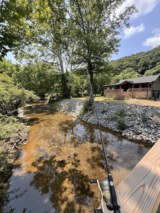 3357 Tyree Springs Rd, Hendersonville, TN 37075 - dock area featuring a deck and a forest view