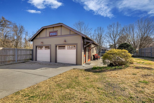 view of property exterior featuring a lawn and fence