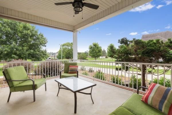 view of patio with ceiling fan