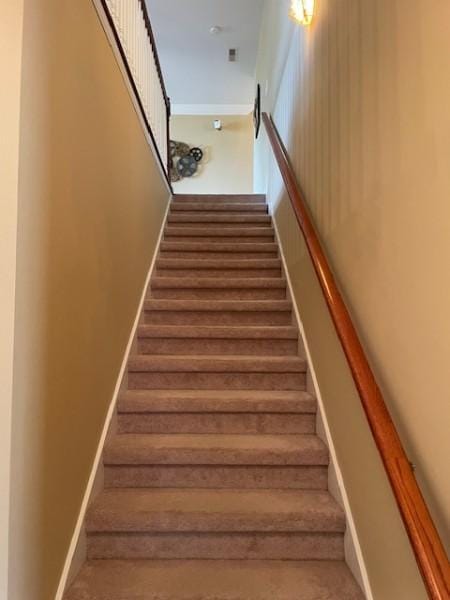 staircase with baseboards